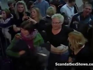Bloke Fuck two sensational chicks at a stage in front of an audience