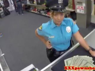 Latina cop posing for flirty pics in uniform